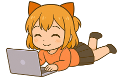 Ciara of Cawaii Creatives lying down using a laptop